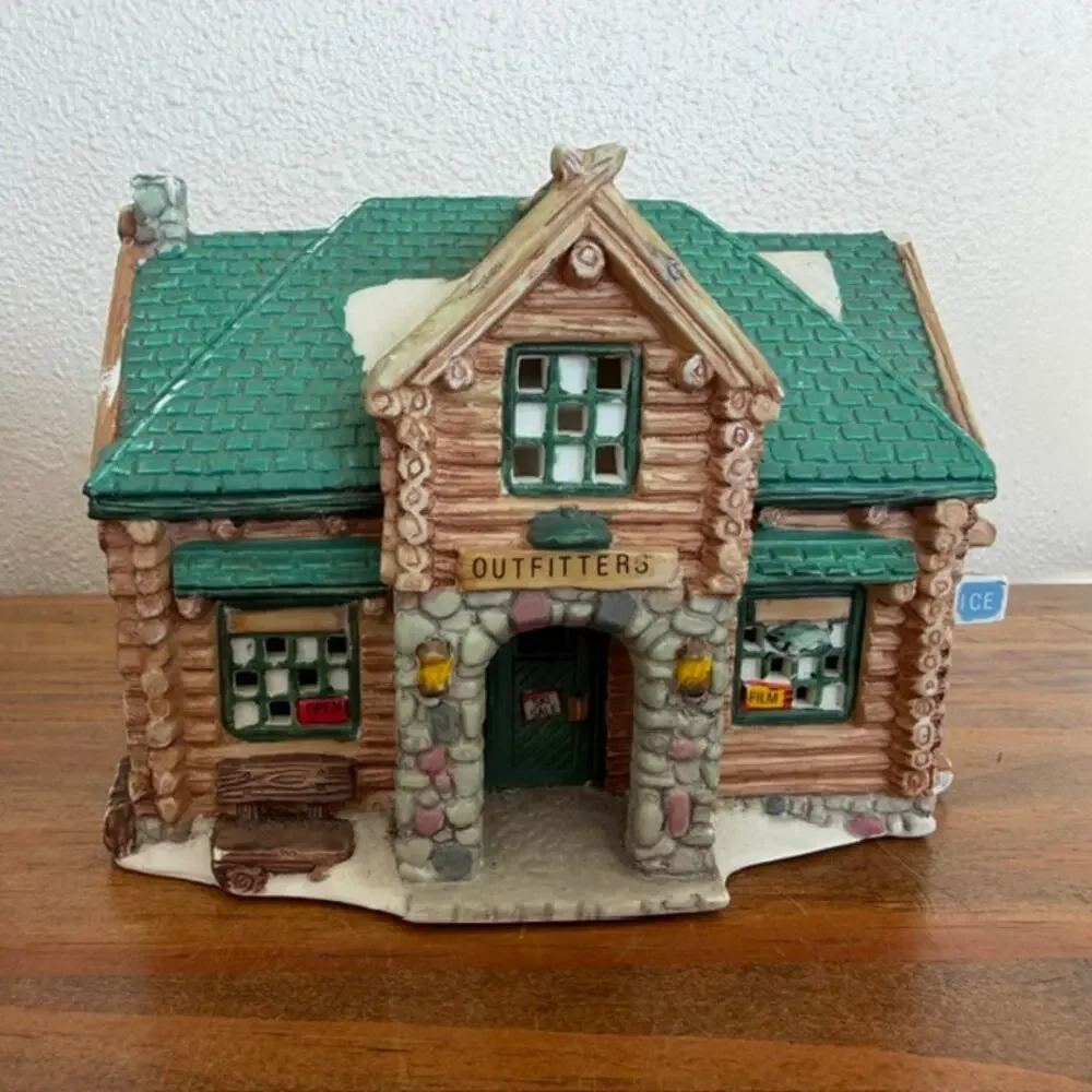 Seasonal Specialties Outfitters Shop and Christmas Village Log Cabin